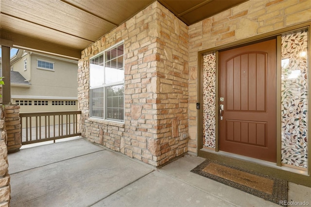 2647 Gray Wolf Loop, Broomfield, CO 80023 - property entrance with covered porch and stone siding