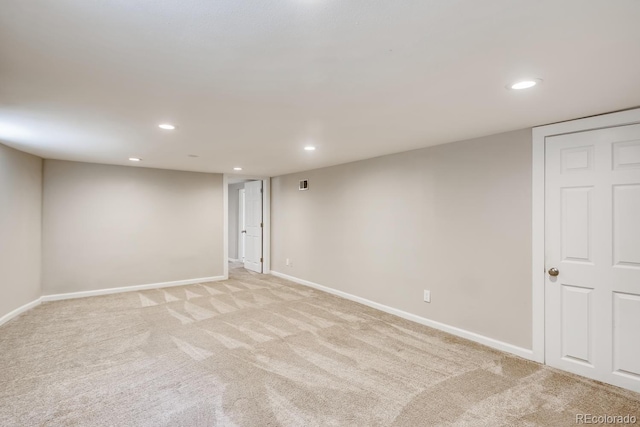 basement with light colored carpet