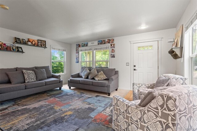 9272 E 108th Ave, Commerce City, CO 80640 - living room featuring plenty of natural light