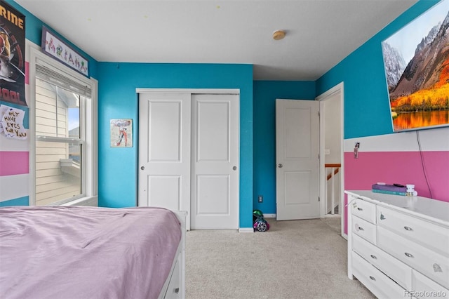 9272 E 108th Ave, Commerce City, CO 80640 - bedroom with light colored carpet and a closet