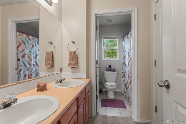 9272 E 108th Ave, Commerce City, CO 80640 - full bathroom featuring tile patterned floors, double vanity, and a shower with curtain