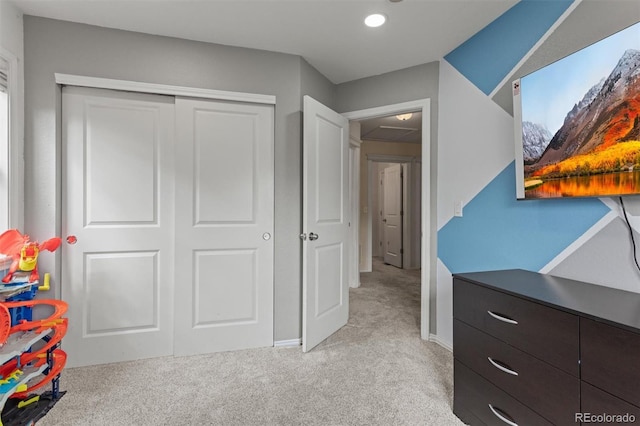 9272 E 108th Ave, Commerce City, CO 80640 - bedroom with light colored carpet, a closet, and recessed lighting