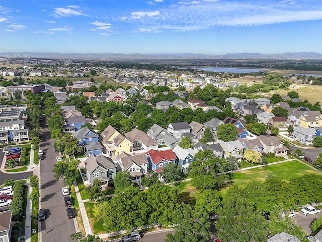 9272 E 108th Ave, Commerce City, CO 80640 - aerial perspective of suburban area featuring a water and mountain view