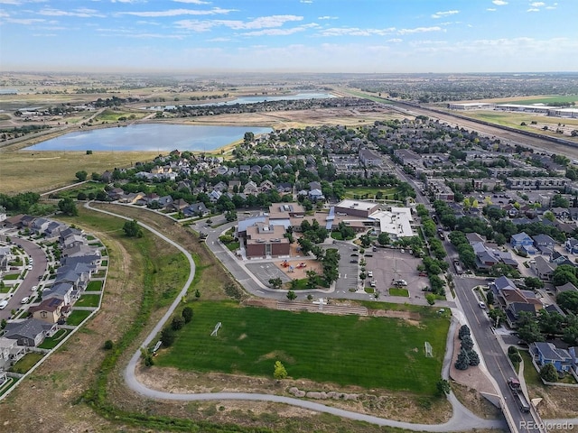 9272 E 108th Ave, Commerce City, CO 80640 - aerial view of property and surrounding area with a nearby body of water and nearby suburban area