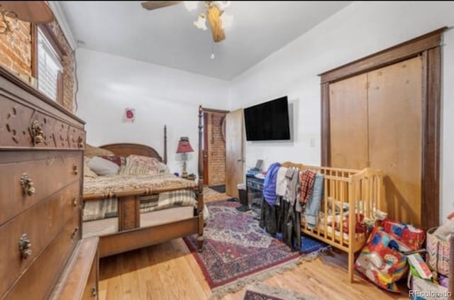 bedroom featuring ceiling fan and wood-type flooring