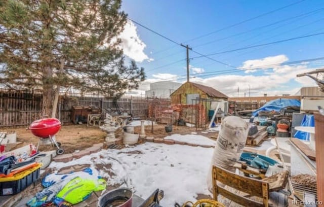 view of yard covered in snow