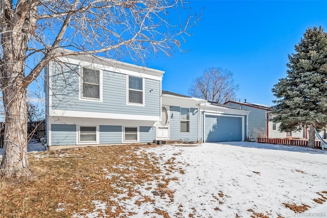 tri-level home with an attached garage