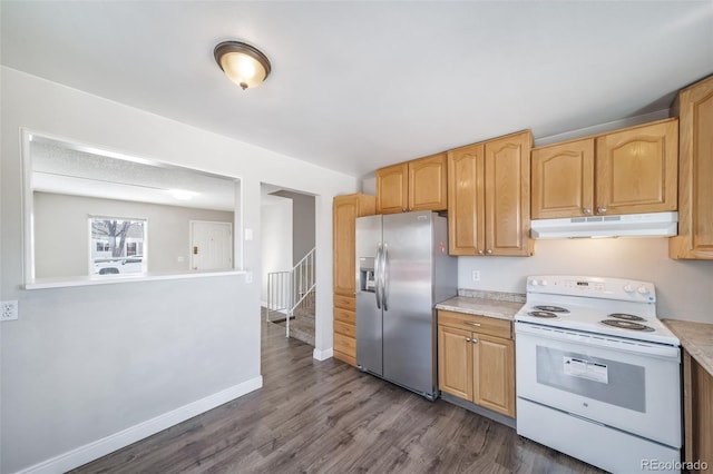 kitchen with electric range, light countertops, stainless steel refrigerator with ice dispenser, and under cabinet range hood