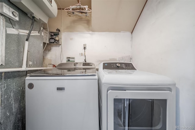 laundry area with laundry area and washer and dryer