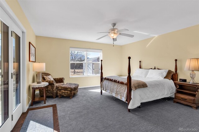 bedroom with dark carpet and ceiling fan