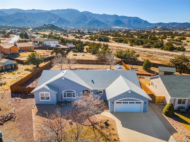 drone / aerial view featuring a mountain view