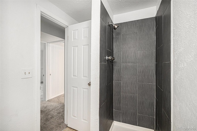 3246 S Nucla St, Aurora, CO 80013 - bathroom featuring tiled shower