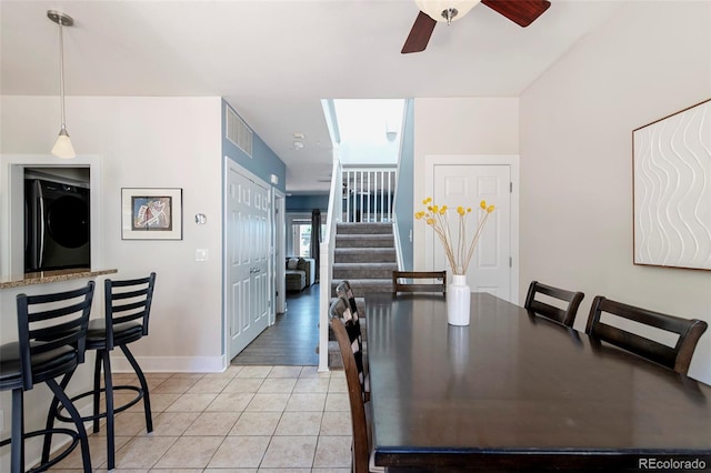2800 Aurora Ave Unit 121, Boulder, CO 80303 - dining room with a ceiling fan, stairway, and light tile patterned flooring