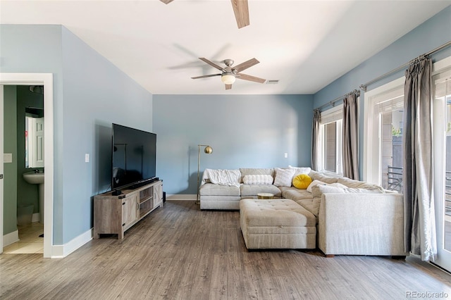 2800 Aurora Ave Unit 121, Boulder, CO 80303 - living room featuring ceiling fan and wood finished floors