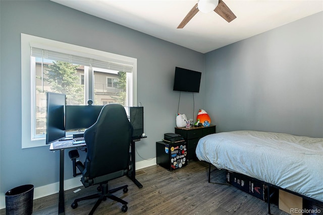 2800 Aurora Ave Unit 121, Boulder, CO 80303 - bedroom featuring wood finished floors, a desk, and ceiling fan