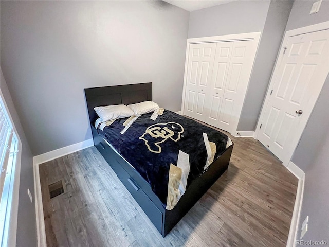 2800 Aurora Ave Unit 121, Boulder, CO 80303 - bedroom featuring wood finished floors and a closet