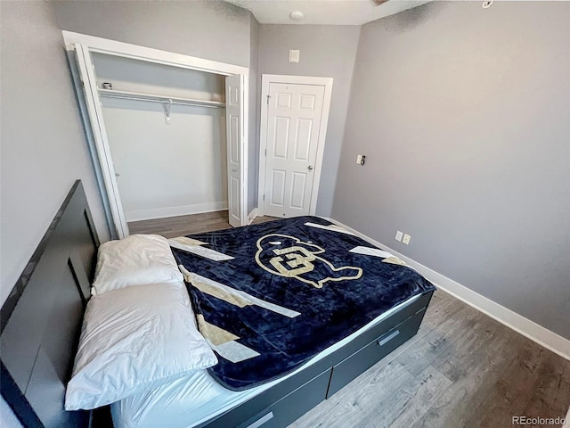 2800 Aurora Ave Unit 121, Boulder, CO 80303 - bedroom with wood finished floors and a closet