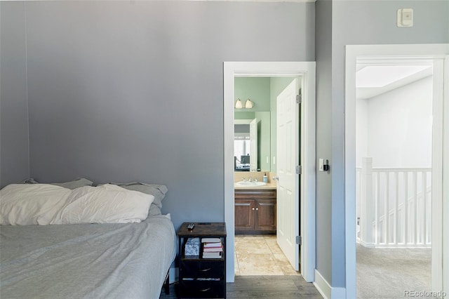 2800 Aurora Ave Unit 121, Boulder, CO 80303 - bedroom with ensuite bath and a sink