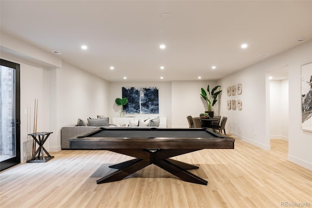 playroom with light hardwood / wood-style flooring