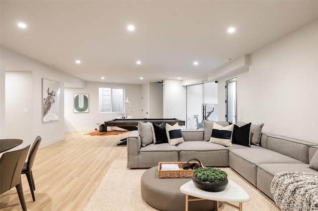 living room with light hardwood / wood-style floors