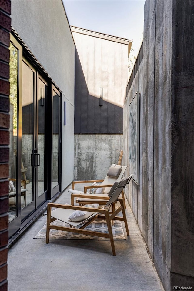 balcony featuring french doors