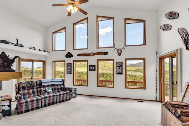 90 Riggs Rd, Westcliffe, CO 81252 - carpeted living room featuring high vaulted ceiling and ceiling fan