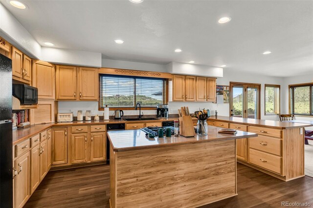 90 Riggs Rd, Westcliffe, CO 81252 - kitchen with a peninsula, black microwave, dark wood-style flooring, a center island, and recessed lighting