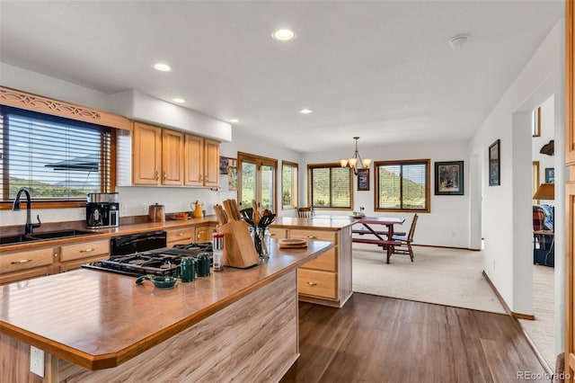 90 Riggs Rd, Westcliffe, CO 81252 - kitchen featuring a kitchen island, healthy amount of natural light, dark wood finished floors, a chandelier, and recessed lighting