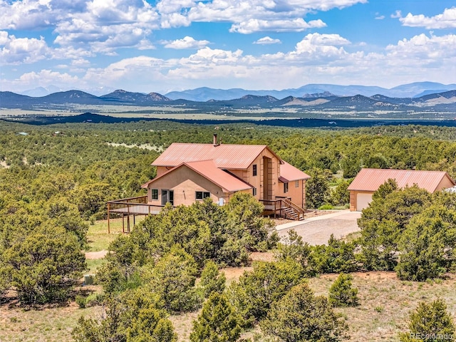 90 Riggs Rd, Westcliffe, CO 81252 - view of mountain backdrop featuring a heavily wooded area