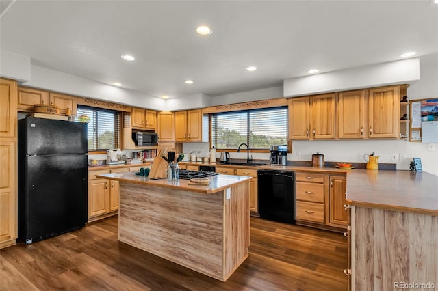 90 Riggs Rd, Westcliffe, CO 81252 - kitchen with black appliances, healthy amount of natural light, dark wood-style flooring, recessed lighting, and a center island