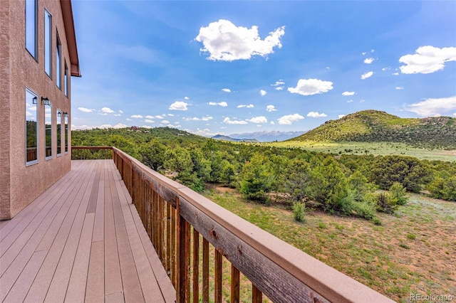 90 Riggs Rd, Westcliffe, CO 81252 - wooden deck with a mountain view