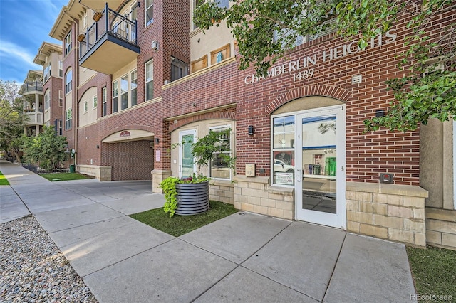 property entrance with a balcony