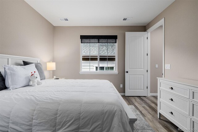 3059 Morningbird Ln, Castle Rock, CO 80109 - bedroom with wood finished floors and baseboards