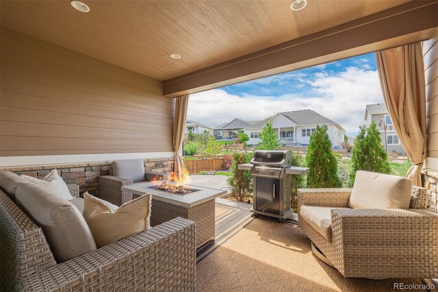 3059 Morningbird Ln, Castle Rock, CO 80109 - view of patio / terrace featuring an outdoor living space with a fire pit, a residential view, and grilling area