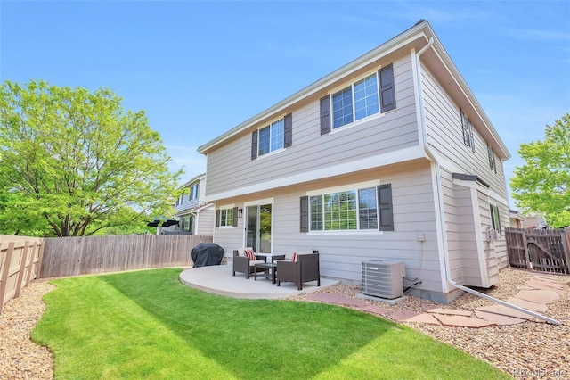 7472 S Memphis St, Aurora, CO 80016 - back of house with central air condition unit and a patio