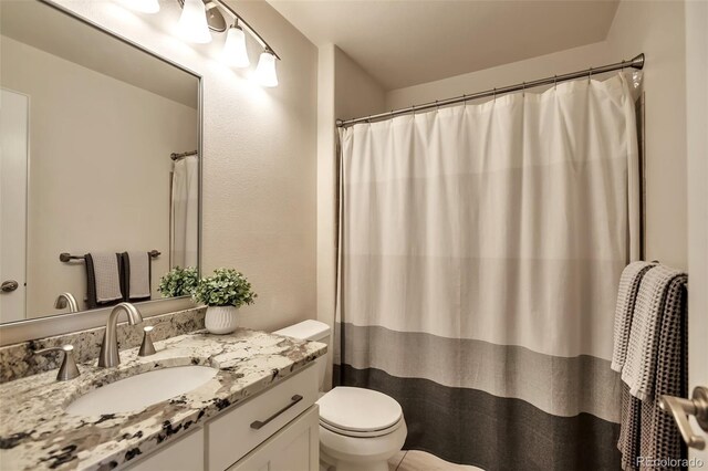 7472 S Memphis St, Aurora, CO 80016 - bathroom with toilet and vanity