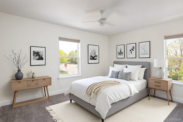 10109 E 28th Ave, Denver, CO 80238 - bedroom featuring light carpet, baseboards, and a ceiling fan