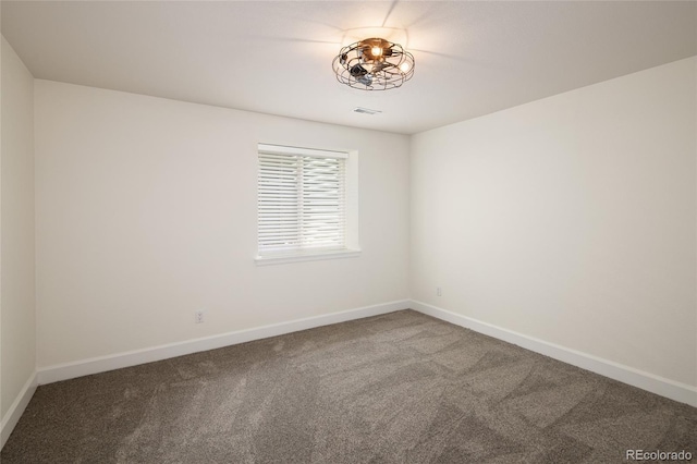 10109 E 28th Ave, Denver, CO 80238 - carpeted empty room featuring baseboards
