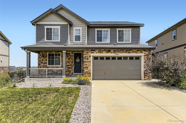 7360 S Old Hammer Way, Aurora, CO 80016 - craftsman-style house featuring covered porch, a garage, driveway, stone siding, and roof with shingles
