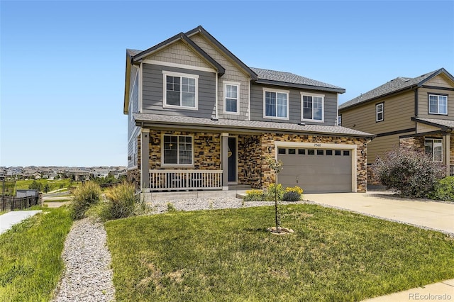 7360 S Old Hammer Way, Aurora, CO 80016 - view of front of house featuring covered porch, a garage, concrete driveway, stone siding, and a front yard