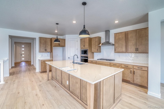 23738 E 42nd Ave, Aurora, CO 80019 - kitchen with wall chimney range hood, appliances with stainless steel finishes, tasteful backsplash, light wood-style floors, and recessed lighting