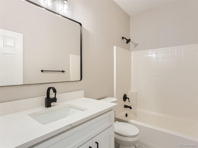 full bathroom featuring vanity, toilet, and bathtub / shower combination