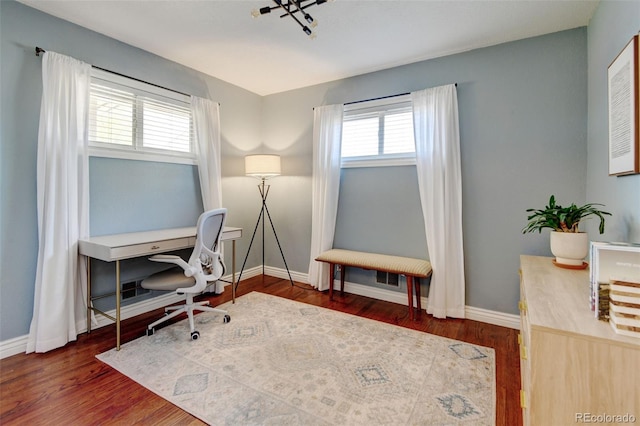 10769 Carrol Ln, Northglenn, CO 80233 - office featuring baseboards and wood finished floors