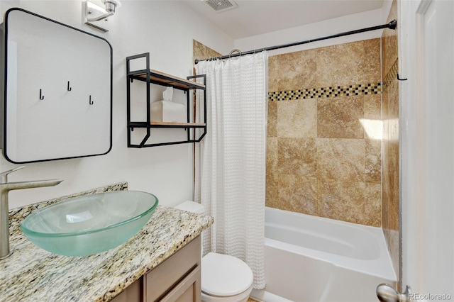 10769 Carrol Ln, Northglenn, CO 80233 - bathroom with toilet, shower / tub combo, and vanity