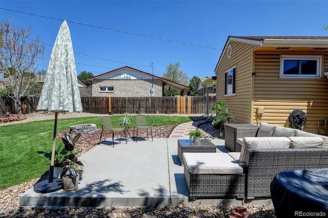 10769 Carrol Ln, Northglenn, CO 80233 - view of patio with an outdoor living space with a fire pit