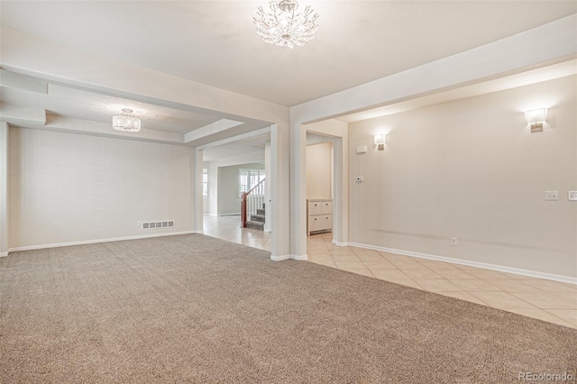 10272 Greenfield Cir, Parker, CO 80134 - unfurnished room featuring light carpet, stairs, baseboards, a chandelier, and light tile patterned floors