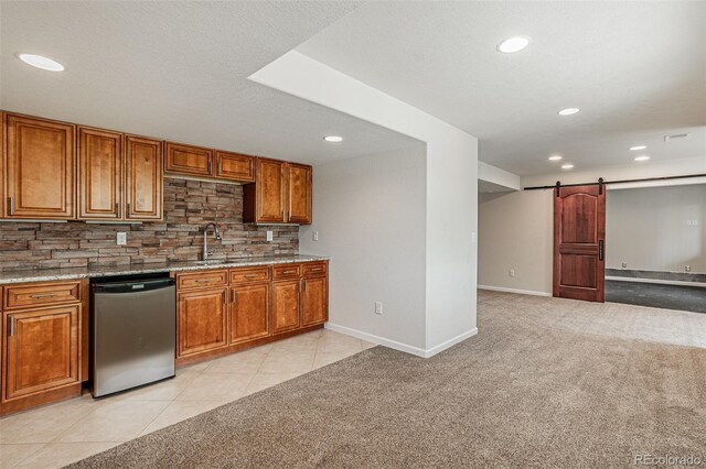 10272 Greenfield Cir, Parker, CO 80134 - kitchen featuring dishwasher, light carpet, brown cabinets, and recessed lighting