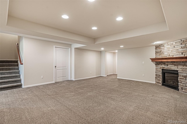 10272 Greenfield Cir, Parker, CO 80134 - finished basement with carpet floors, stairway, recessed lighting, a fireplace, and baseboards
