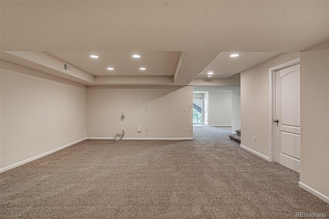 10272 Greenfield Cir, Parker, CO 80134 - carpeted empty room with recessed lighting, baseboards, stairs, and a raised ceiling