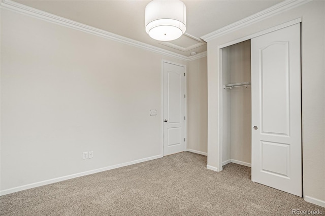 10272 Greenfield Cir, Parker, CO 80134 - unfurnished bedroom featuring light colored carpet, crown molding, baseboards, and a closet